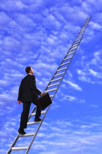 Man Walking up Ladder to Clouds